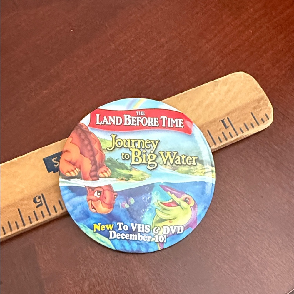 Vintage the land before time brooch